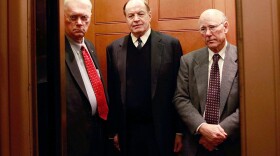 Sens. Jim Bunning (R-KY), Richard Shelby (R-AL), and Pat Roberts (R-KS) get into an elevator after a Senate vote Dec. 21.