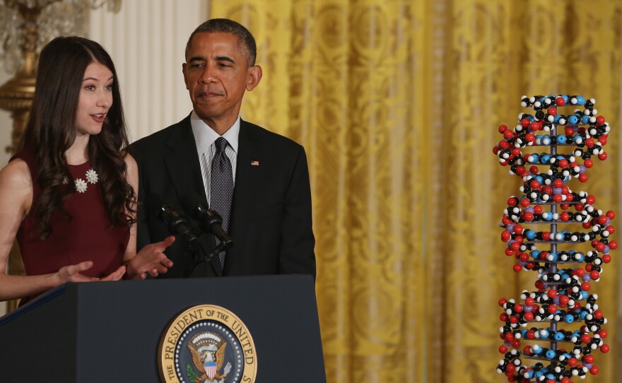 Harvard University student Elana Simon introduces President Obama before he spoke at the White House Friday about an initiative to encourage research into more precise medicine.