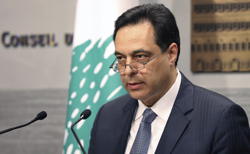 In this photo released by the Lebanese Government, former Lebanese Prime Minister Hassan Diab, gives a speech at the Government House in Beirut, Lebanon, Saturday, March. 7, 2020.