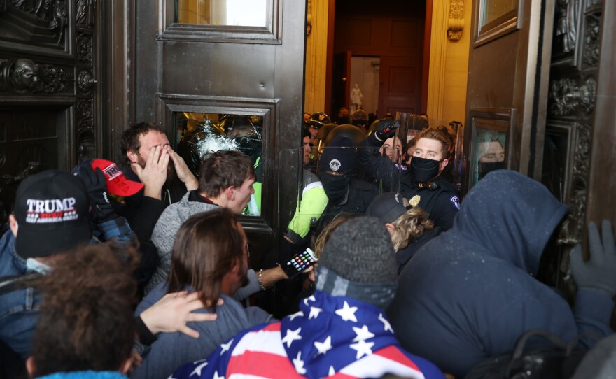 Protesters gather at the door of the U.S. Capitol Building on January 6, 2021.