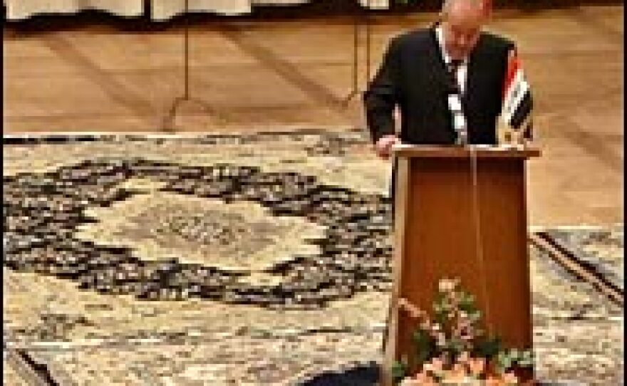Iraq's Interim Prime Minister Iyad Allawi speaks during the country's parliament meeting in Baghdad, March 16, 2005.