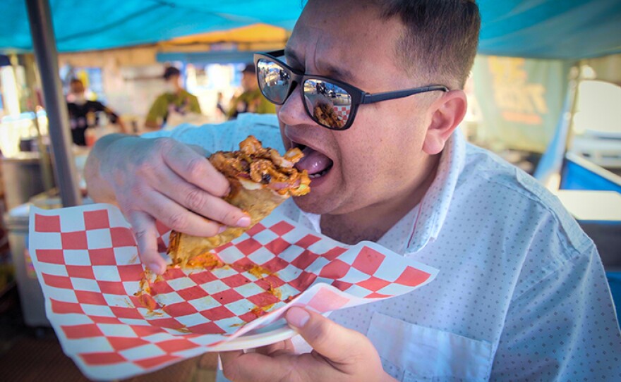 Host Jorge Meraz is about to fall in love with the camarón enchilado taco at Titos restaurant located in Playas de Tijuana, Baja Calif.