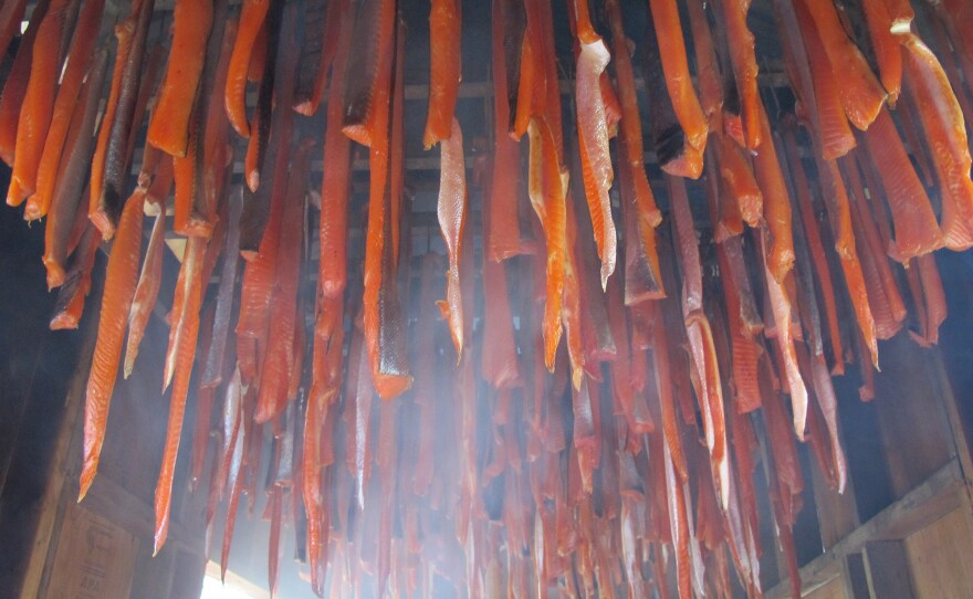 Strips of silver salmon hang in Valerie Davidson's smokehouse on the Kuskokwim River in Bethel, Alaska.