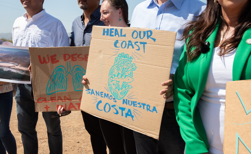 Environmental advocates and elected officials at a press conference in Otay Mesa West on July 16, 2026. They demanded that a renewal of the United States-Mexico-Canada Agreement include long-term solutions to cross-border pollution. 