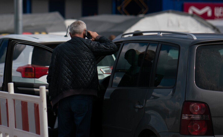 People in the convoy of cars coming from Russian-held Ukrainian territory said all men aged 18 to 35 were removed by Russian forces and sent back to the occupied areas.