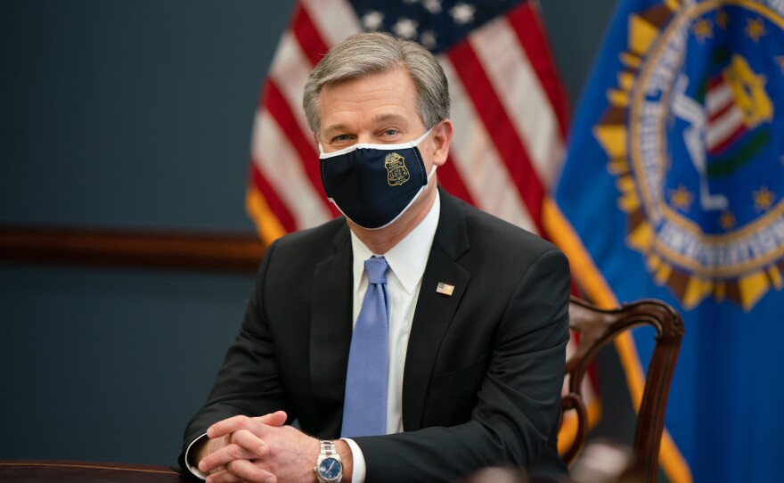 FBI Director Christopher Wray spoke with NPR about its sprawling investigation into the Jan. 6 attack on the Capitol and life after the Trump administration.