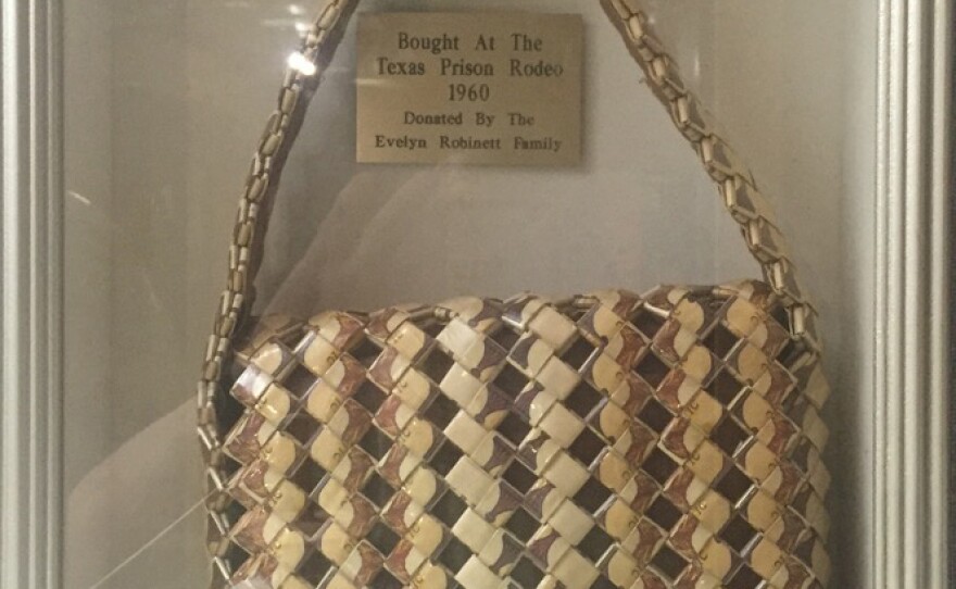 A convict made this purse out of Camel cigarette packages. Tobacco had been sold in prison commissaries but was banned in 1995.