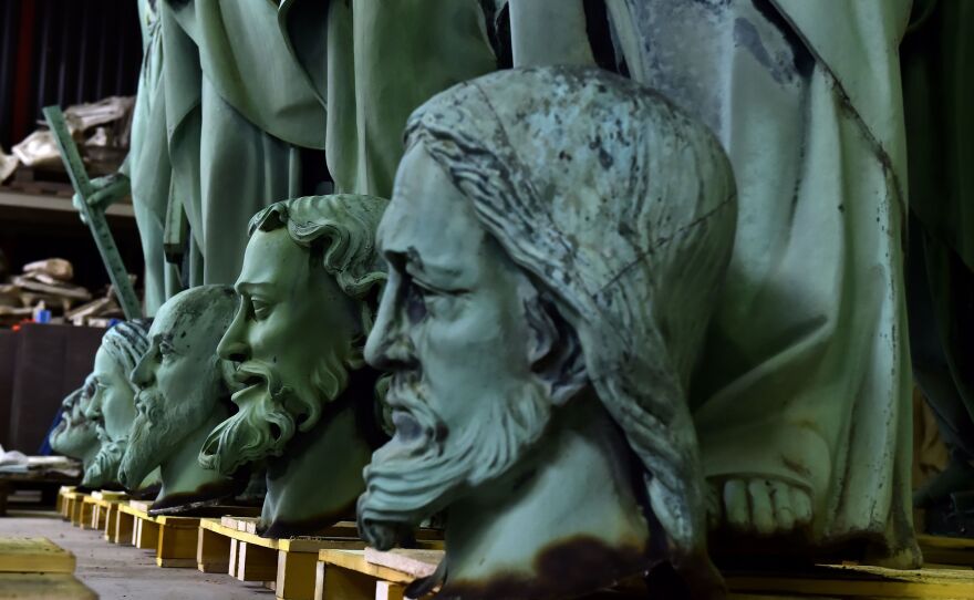 Statues that had sat around the spire of Notre Dame were spared because they had already been removed restoration company's Socra workshop.
