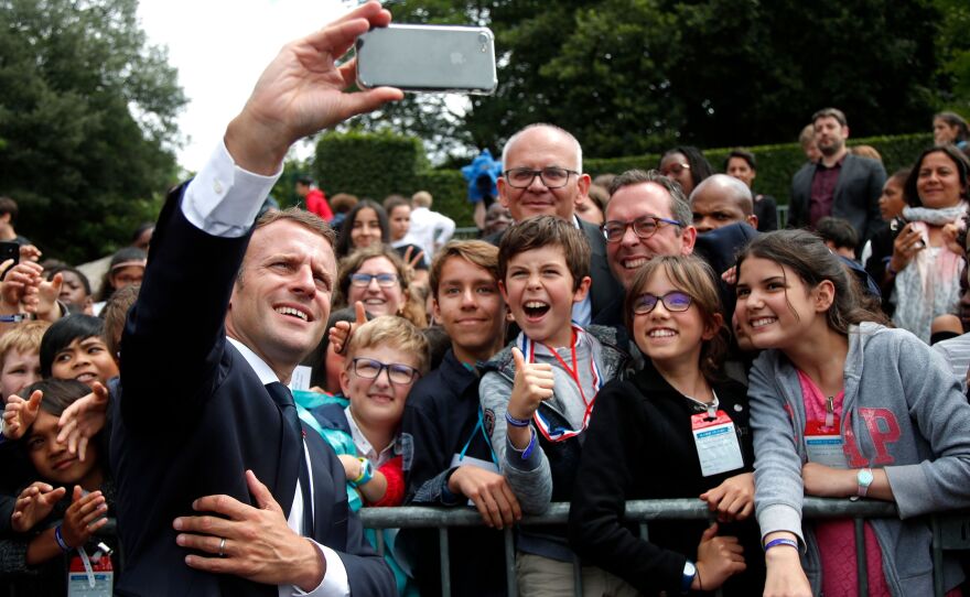 While French President, Emmanuel Macron, took selfies with some members of the crowd, he scolded one teen at the Mont Valerien National Memorial in Suresnes.