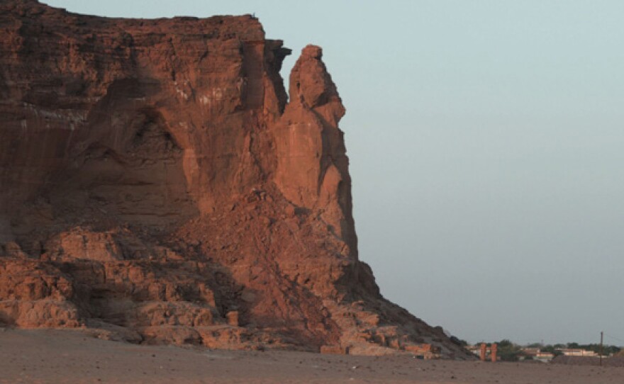 Jebel Barkal (Pure Mountain) in the shadow of the Sudanese sun. The Kushites and Egyptians saw the pinnacle as a sacred rearing cobra.