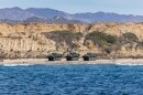 U.S. Marines with 3rd Assault Amphibian Battalion, 1st Marine Division, prepare to drive Amphibious Combat Vehicles during surf transit training off the coast of Marine Corps Base Camp Pendleton, California, Nov. 19, 2024. (U.S. Marine Corps photo by Cpl. Juan Torres)