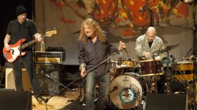 (l to r): Byron House, Robert Plant and Marco Giovino perform on stage, February 9, 2011, War Memorial Auditorium, Nashville, Tennessee. 