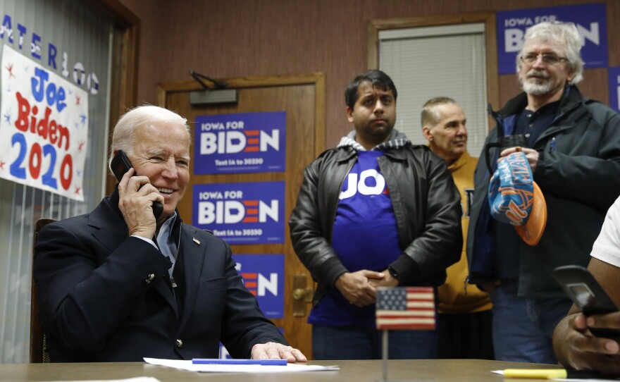 Former Vice President Joe Biden calls potential caucusgoers during a visit to a campaign field office in Waterloo, Iowa, earlier this month.