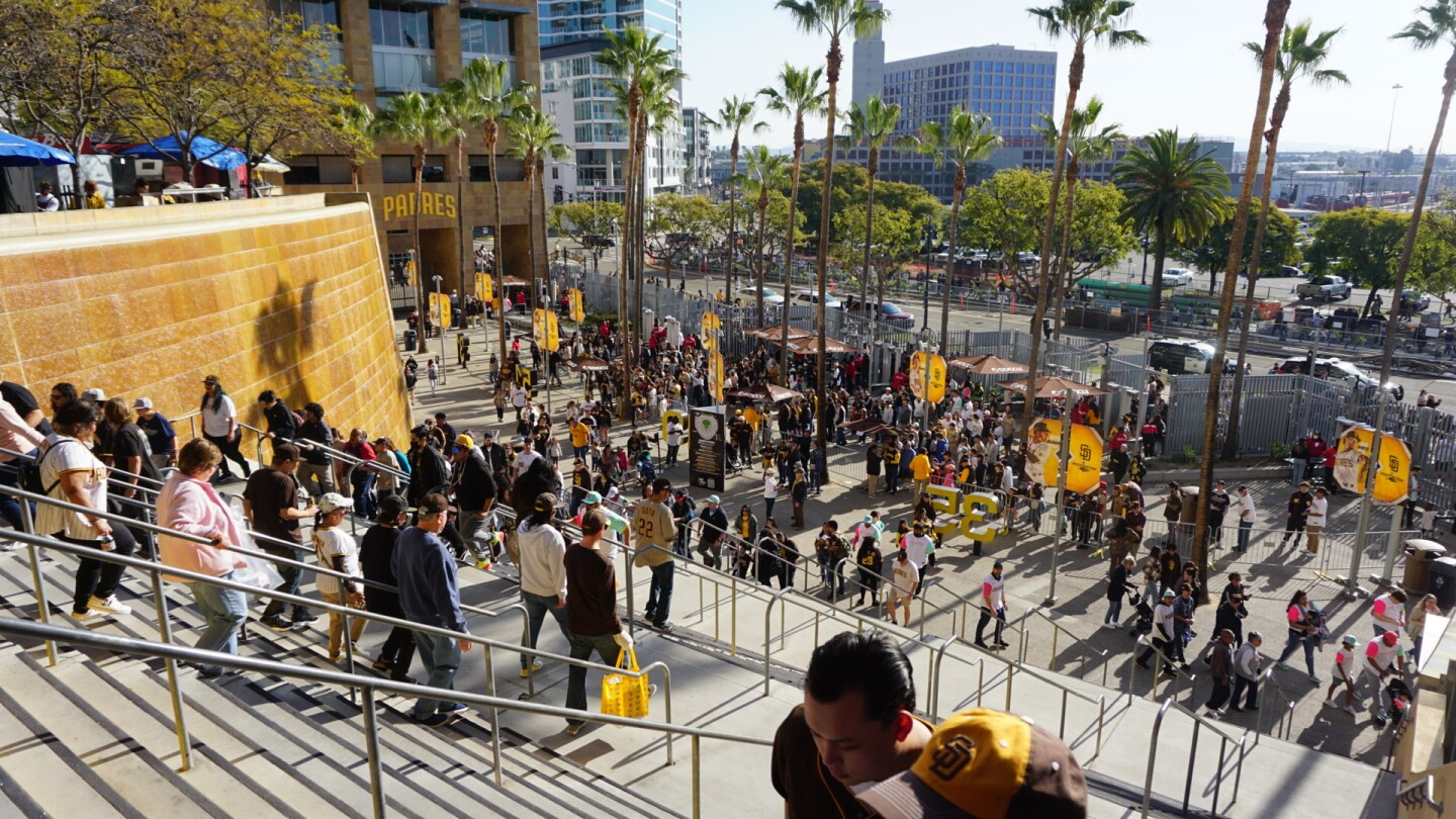 Crowds arrive at Petco Park for the San Diego Padres 2023 Fanfest.