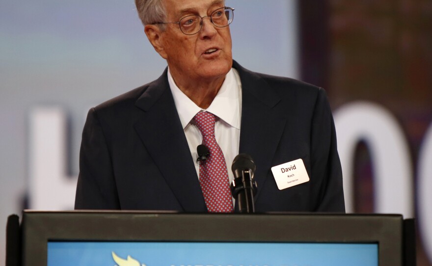 David Koch speaks at the Defending the American Dream summit in 2015. He and his brother Charles lead a conservative political network that plans to spend hundreds of millions of dollars on the 2016 elections.