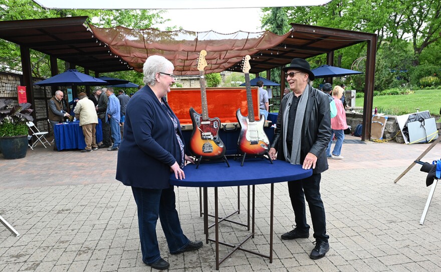 Dave Hinson (left) appraises a 1965 Fender Jaguar & 1964 Stratocaster, in Boise, Idaho.