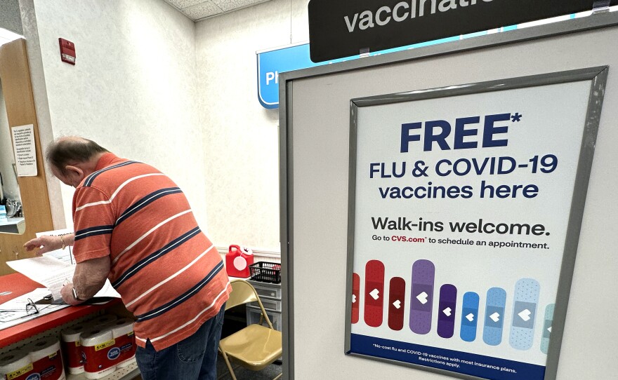 Flu and COVID-19 vaccinations are now available across the U.S., including at this CVS pharmacy in Palatine, Illinois.