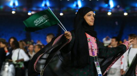 Sarah Attar of Saudi Arabia enters the stadium during the Opening Ceremony of the London 2012 Olympic Games at the Olympic Stadium on July 27, 2012 in London, England. 