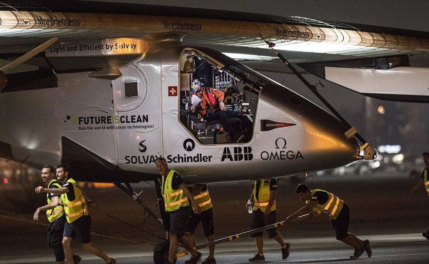 The Solar-powered Solar Impulse 2 aircraft prepares to take off from the Cairo International Airport in the Egyptian capital on Sunday as it heads to Abu Dhabi on the final leg of its world tour.