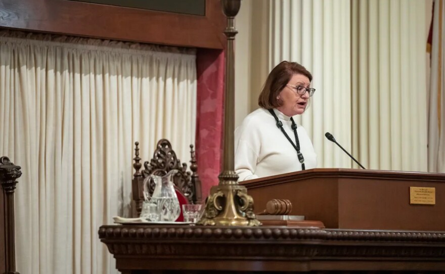 Then-state Sen. President Pro Tem Toni Atkins speaks in the Senate chambers of the state Capitol on Dec. 5, 2022. Her spouse’s housing consulting companies do business with the state and employ lobbyists.