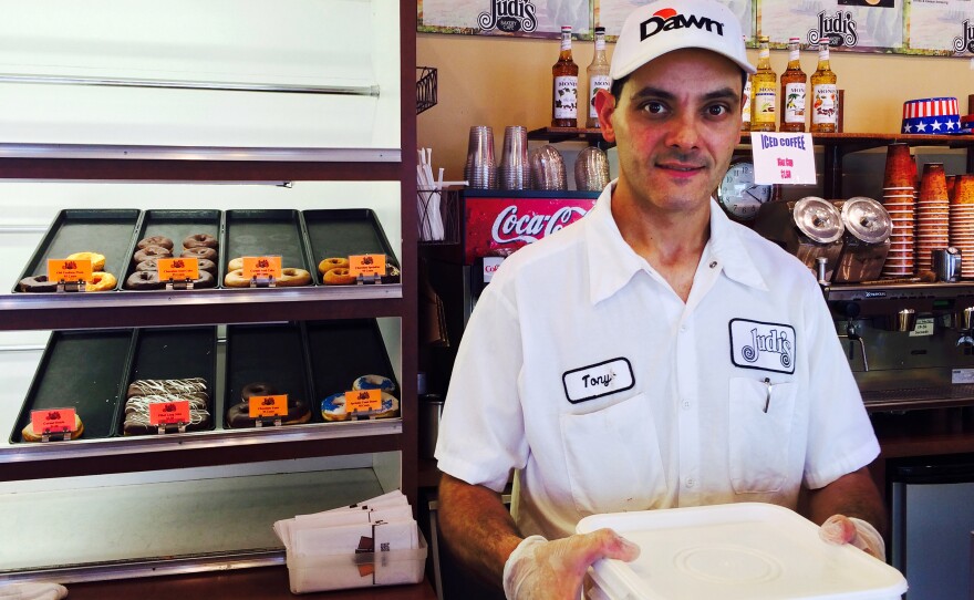 Tony Lordi, production manager at Judy's Bakery in North Kansas City, Mo., holds a 30-pound bucket of liquid egg, which has doubled in cost since May, as a lethal outbreak of avian flu has decimated laying hens in the Midwest.
