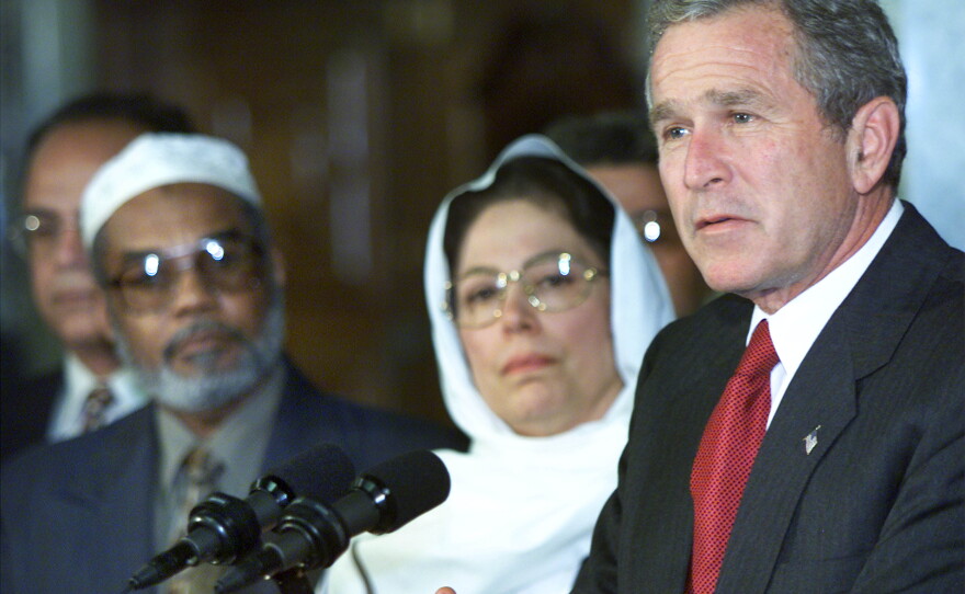 President George W. Bush is seen on Sept. 17, 2001 during a visit to an Islamic center to try to prevent anti-Muslim sentiment in the wake of the September 11th terrorist attacks.