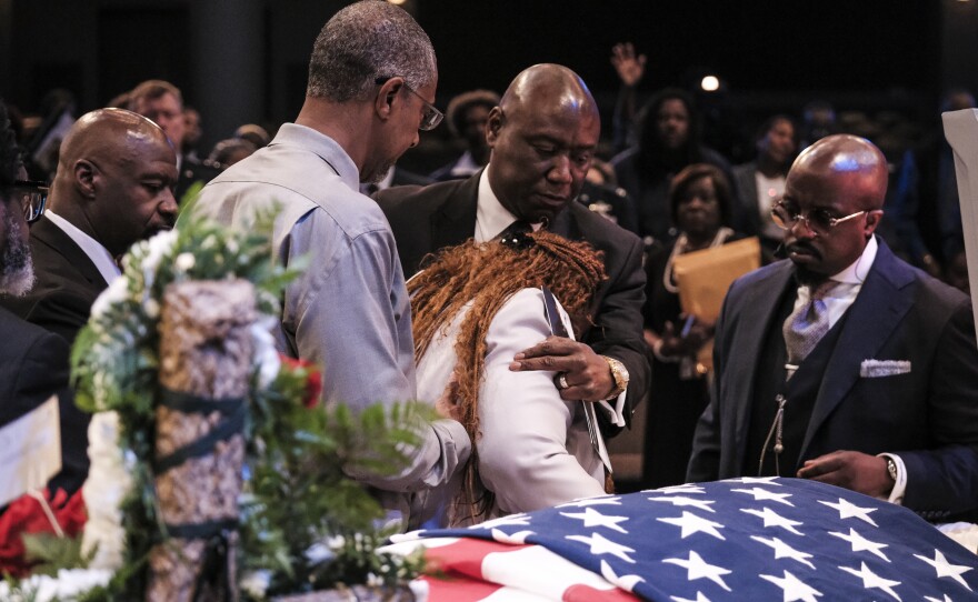 Fortson's mother, Chantimekki Fortson, pays her final respects to her son.