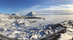 A research team on the frozen land of Antarctica in this undated photo.