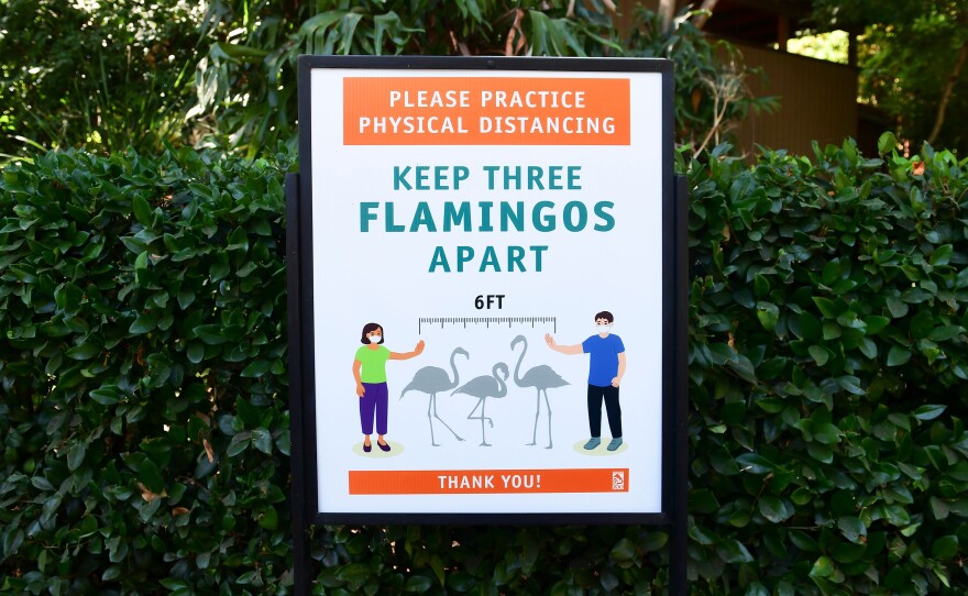 Some businesses, including the Los Angeles Zoo, found creative ways to put "6 feet" into context for visitors.