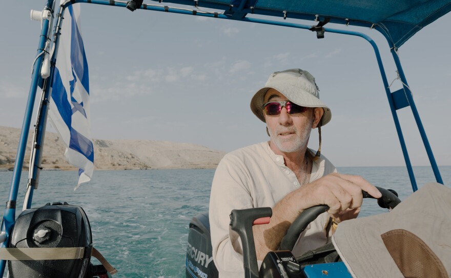 "You've seen a living disaster in front of your eyes," says Jake Ben Zaken, an Israeli who says he operates the only passenger boats on the Dead Sea.