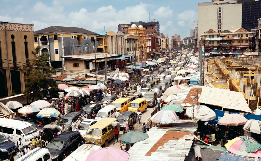 Thousands of vendors do business at Balogun Market in Lagos. The rising cost of fuel has made it harder to do business — and for customers to afford services and goods, let alone public transportation.