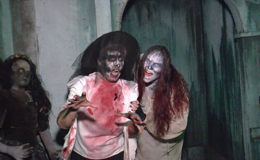 KPBS arts reporter Beth Accomando and Luca Dismukes ready to scare attendees at The Haunted Trail of Balboa Park. Sept. 25, 2025