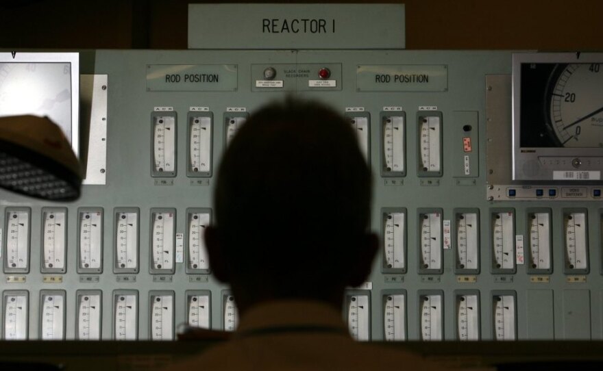 A power station worker monitors one of the reactors in the control room of England's Oldbury Nuclear Power Station in 2006.