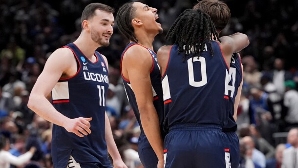 UConn guard Braylon Mullins, right, celebrates his game winning basket with guard Malachi Smith (0) during the second half in the Elite Eight of the NCAA college basketball tournament against Duke, Sunday, March 29, 2026, in Washington.