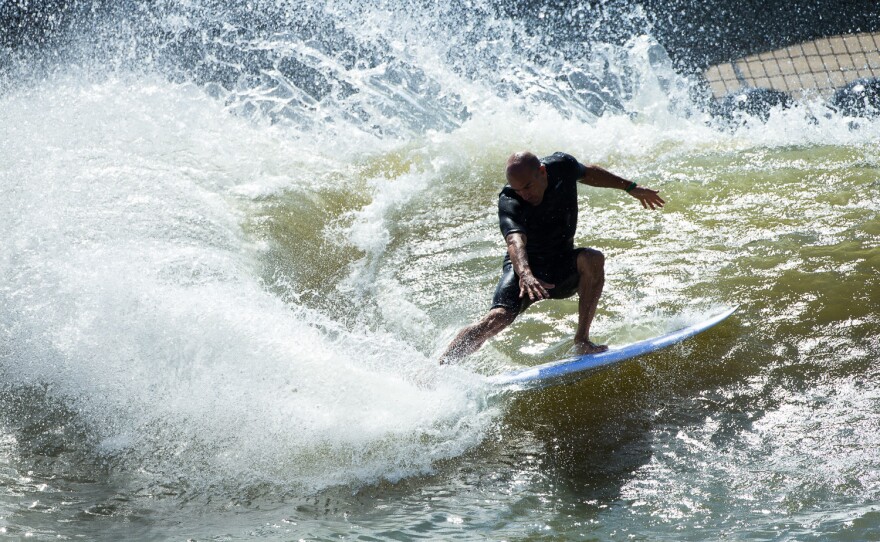 Surfers say the artificial wave at Kelly Slater Wave Co.'s pond has a natural feel. But the technology that creates it requires a several-minutes-long wait between swells.