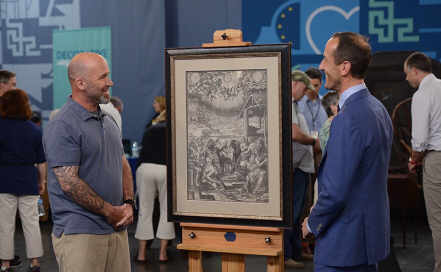 Todd Weyman (right) appraises a 1554 Giorgio Ghisi Engraving after Bronzino in Virginia Beach. 