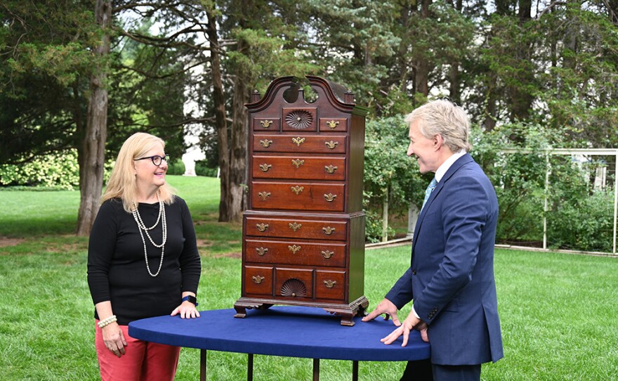 Leigh Keno (right) appraises a Chippendale-style chest-on-chest ca. 1875, in Middletown, Conn.