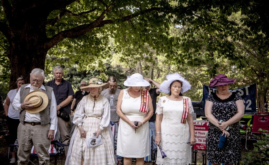 A moment of prayer is held during the celebration marking the 197th anniversary of Nathan Beford Forrest's birthday, in July at Davies Manor Plantation in Bartlett, Tenn.