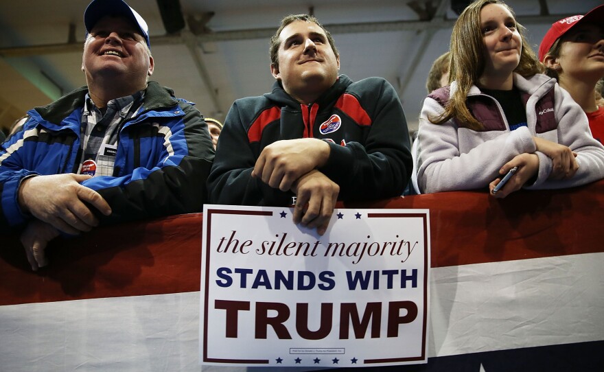 At Donald Trump rallies, like this one in Cedar Falls, Iowa, on Jan. 12, his campaign distributes signs heralding support from the "silent majority."