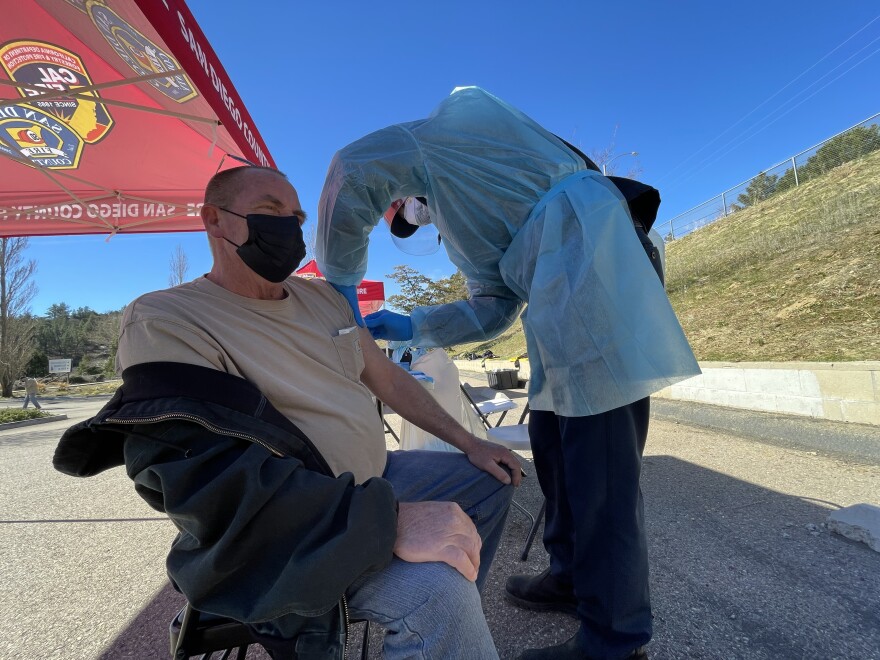 A man receives a COVID-19 vaccine in Julian, Calif. Feb. 3, 2021.