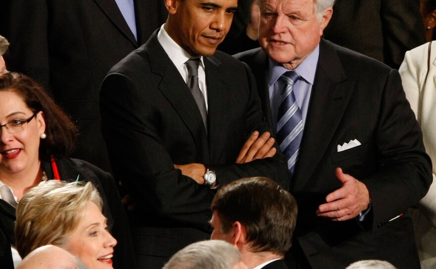 <strong>January 2008:</strong> Then-presidential hopeful Sen. Barack Obama confers with Kennedy before the State of the Union speech by President Bush.