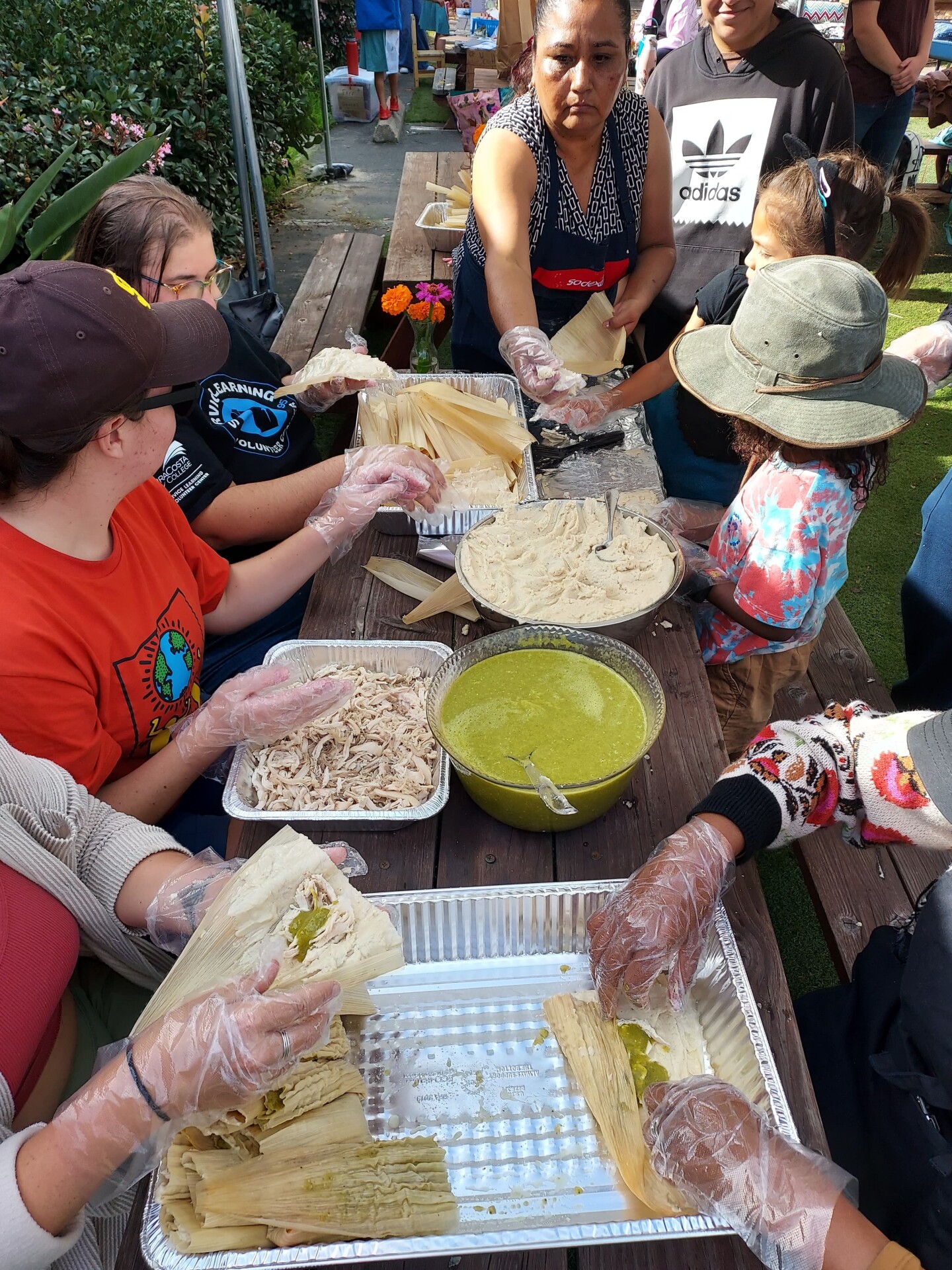 Volunteers make tamales at the Community Roots Farm in Oceanside, Calif. in this undated photo.