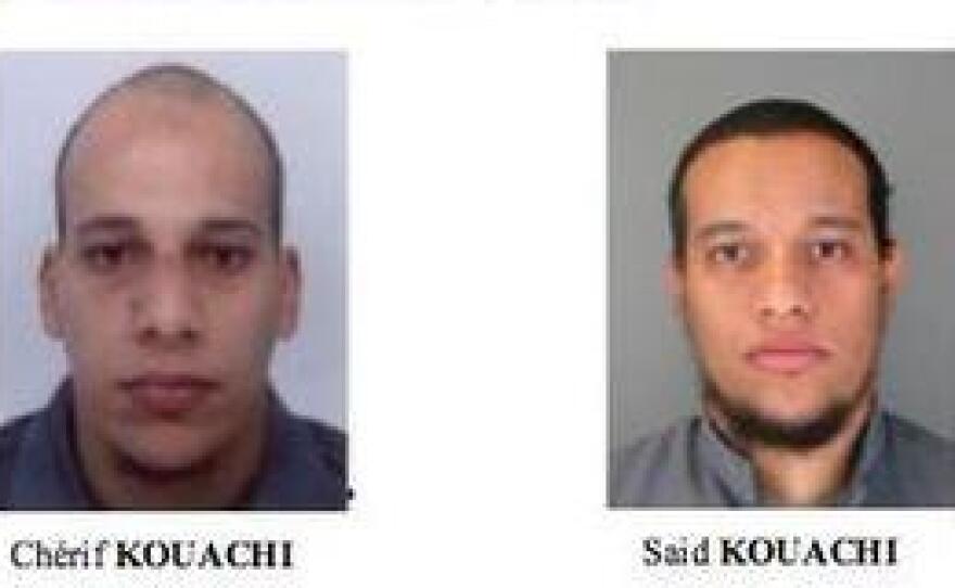 A police bulletin sought the public's help in finding two suspects in the deadly attack on a satirical magazine's Paris offices Wednesday. Pictured are brothers Cherif (left) and Said Kouachi.