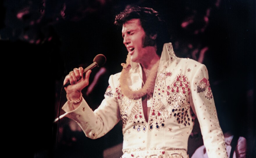 Elvis Presley, pictured performing live, made television history in 1973 with a live concert special, televised globally via satellite. Now, 40 years later, don’t miss one of the most outstanding concert performances of his career.
