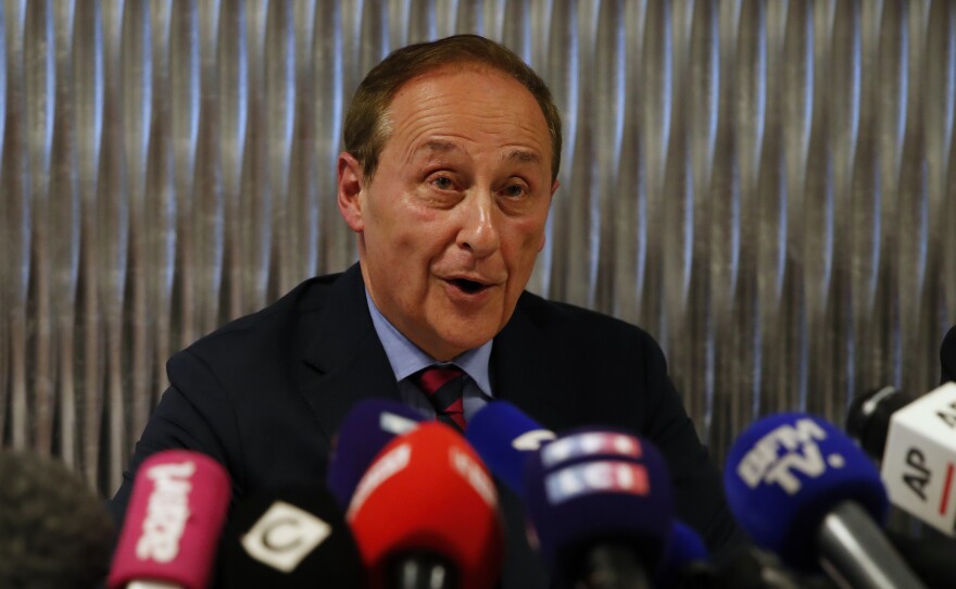 French Ice Skating Federation (FFSG) president Didier Gailhaguet speaks to the media during a press conference in Paris on Wednesday.