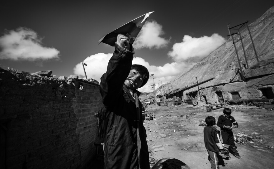A child plays after working in the Cerro Rico mines.