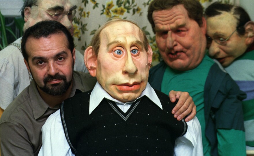 Director Victor Shenderovich poses with a life size puppet of Vladimir Putin in 2000, on the set of a popular satirical NTV television show called "Kukly" (Puppets).