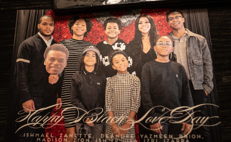 A family portrait honors the life of the late Zaire Kelly.