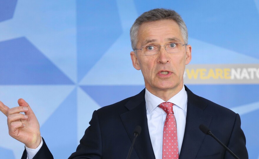 NATO Secretary-General Jens Stoltenberg speaks during a news conference to announce the withdraw of accreditation for staffers of Russia's Mission to NATO, in Brussels on Tuesday.