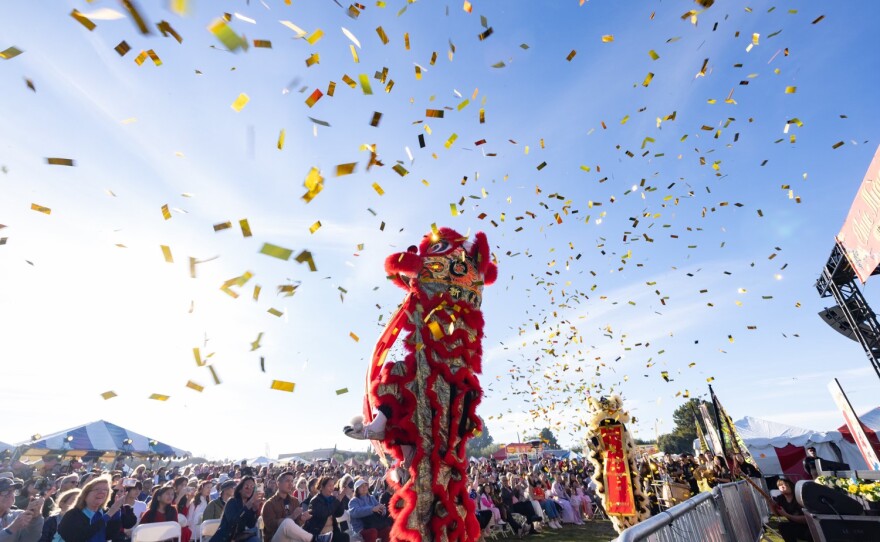 Confetti falls as lion dancers perform at the San Diego Tết Festival on Jan. 31, 2025.